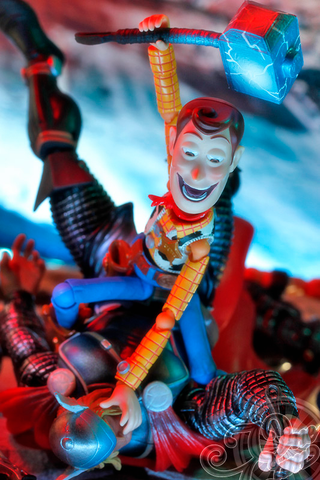 Illustration for article titled Creepy Woody Trolling the World's Coolest Figures and Toys